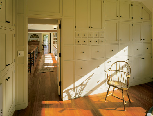 Windows on the project room’s southern and eastern sides provide illumination for Sally’s quilting and rug-hooking projects. The Shaker-style storage cabinets are crafted from formaldehyde-free plywood with FSC-certified poplar frames and doors.